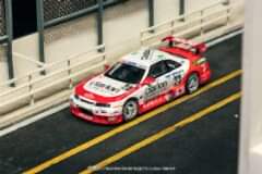 Tarmac Works 1/64 Nissan NISMO GT-R LM 24h of Le Mans 1995 Presentation #23 - HOBBY64